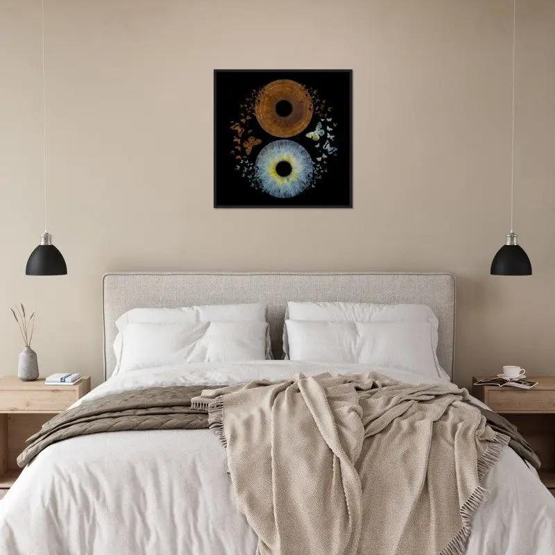 Iris black framed poster displayed above bed in modern bedroom.