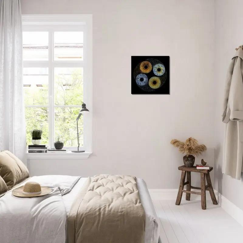 Ethereal Quartet Iris Canvas displayed in a bright bedroom