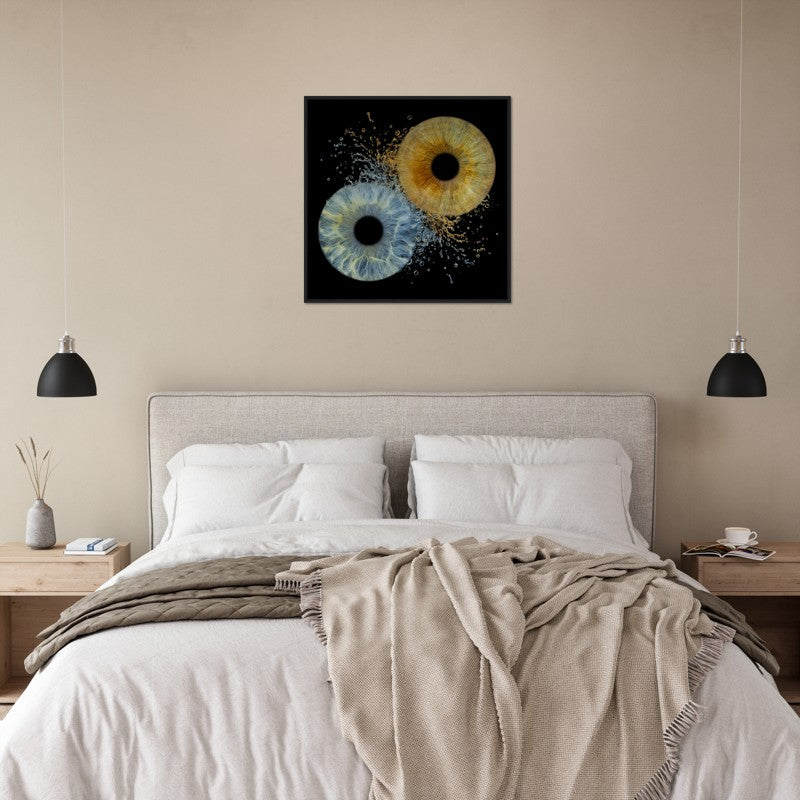 Bedroom with a bed, nightstands, and wall art featuring abstract designs.