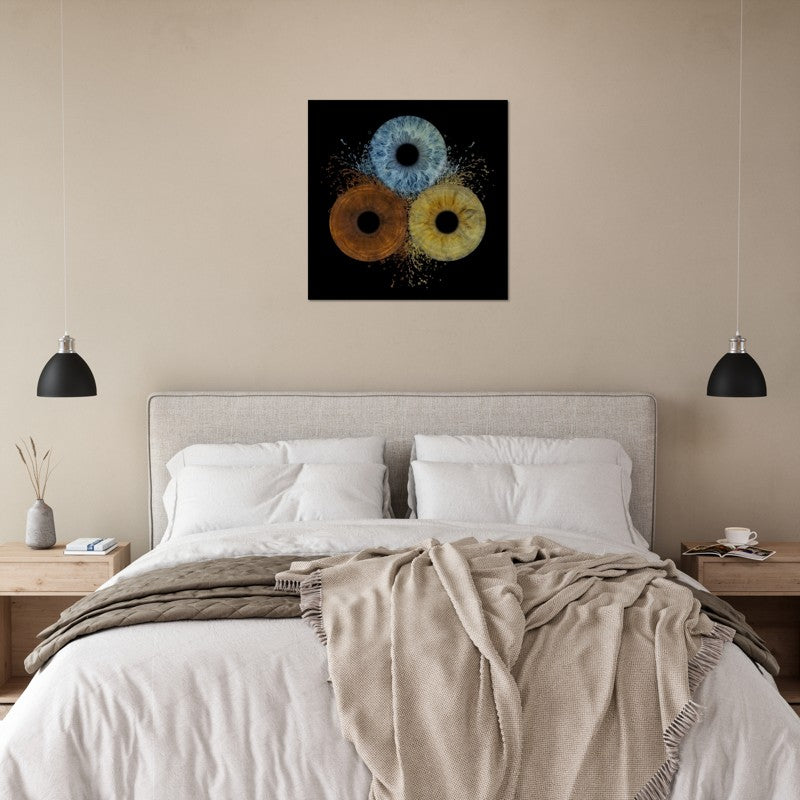 Bedroom with a bed, nightstands, and abstract wall art.